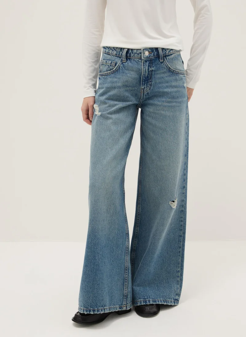 او في اس جينز أوفيس واسع الساق أزرق قطني ممزق